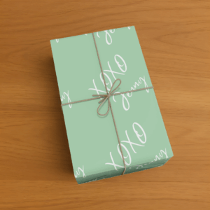 Gift box wrapped in Custom XOXO Wrapping Paper in Sage Green